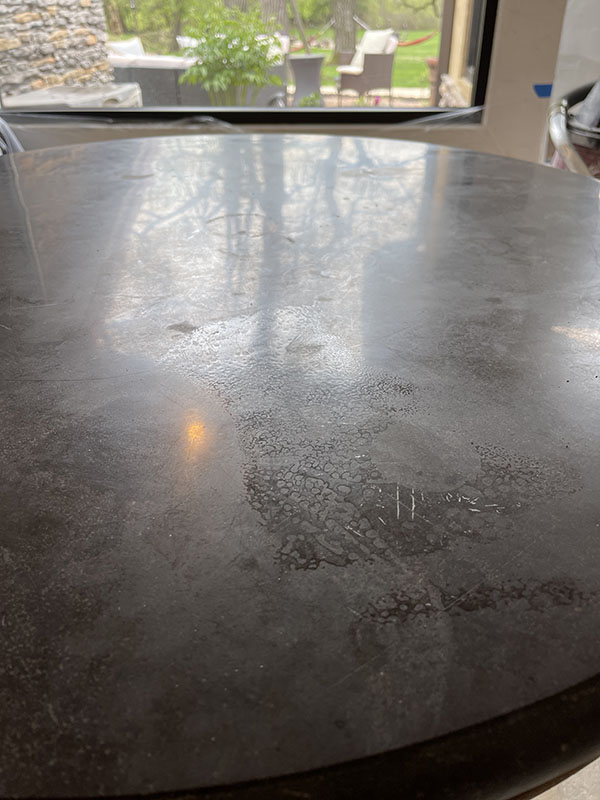 Black limestone table restoration 16