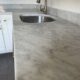 What Should I Consider Before Getting a Refinishing Service for a Marble Kitchen Countertop?